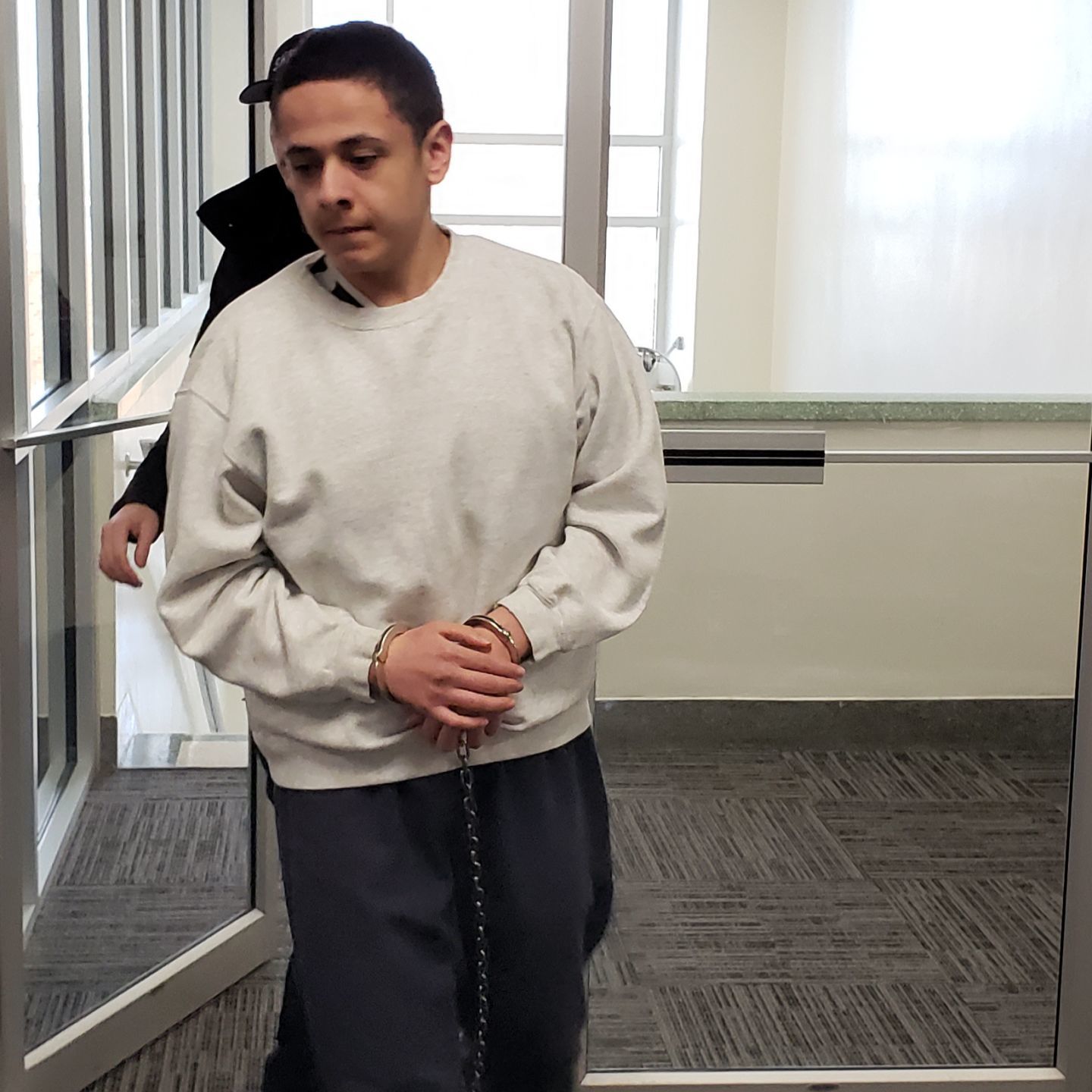 Rodriguez-Romero walks into courtroom